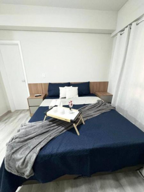 Loft confortável e refinado A